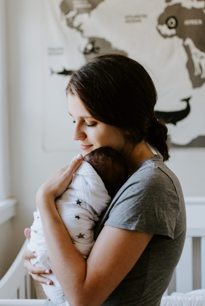 Woman holding child