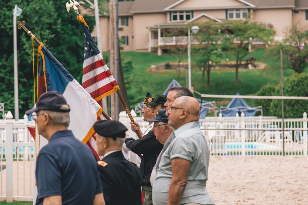 Men near flags