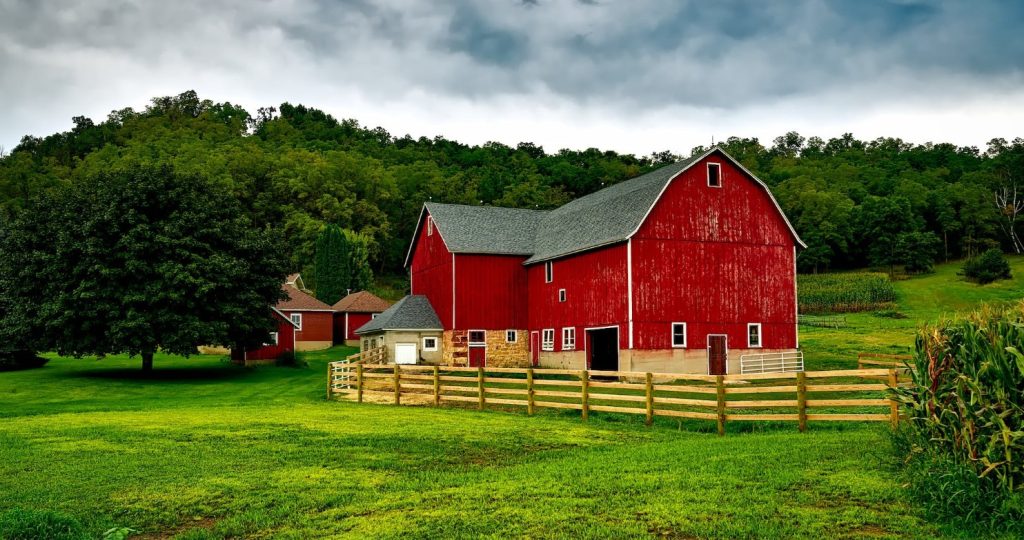 Red barn, fence, trees