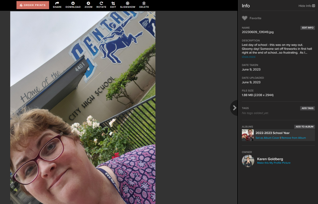 Screenshot of woman looking at camera with photo info on right