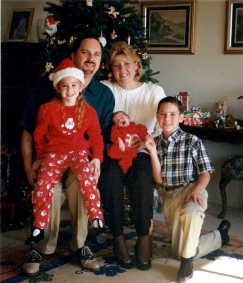 Family in front of Christmas tree 1998