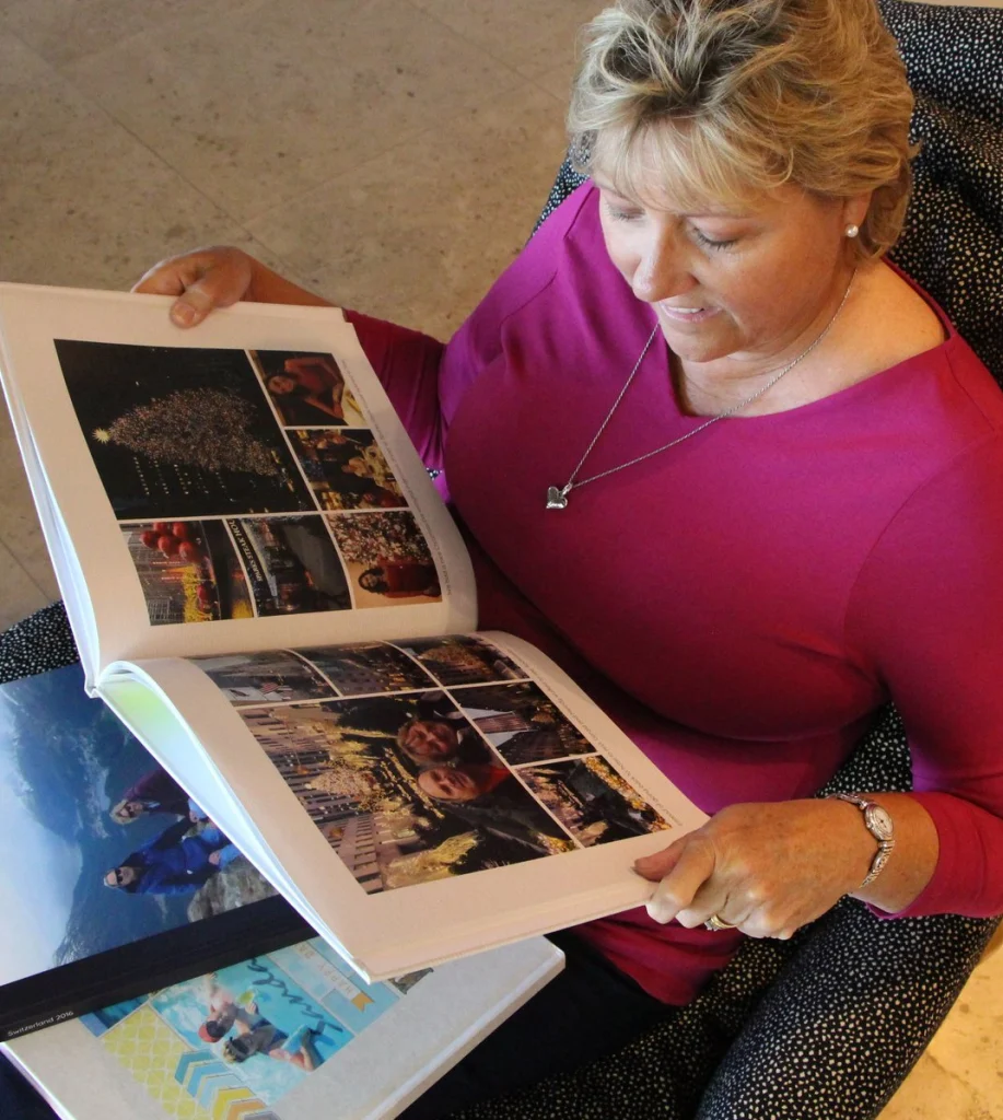 Woman holding photo book