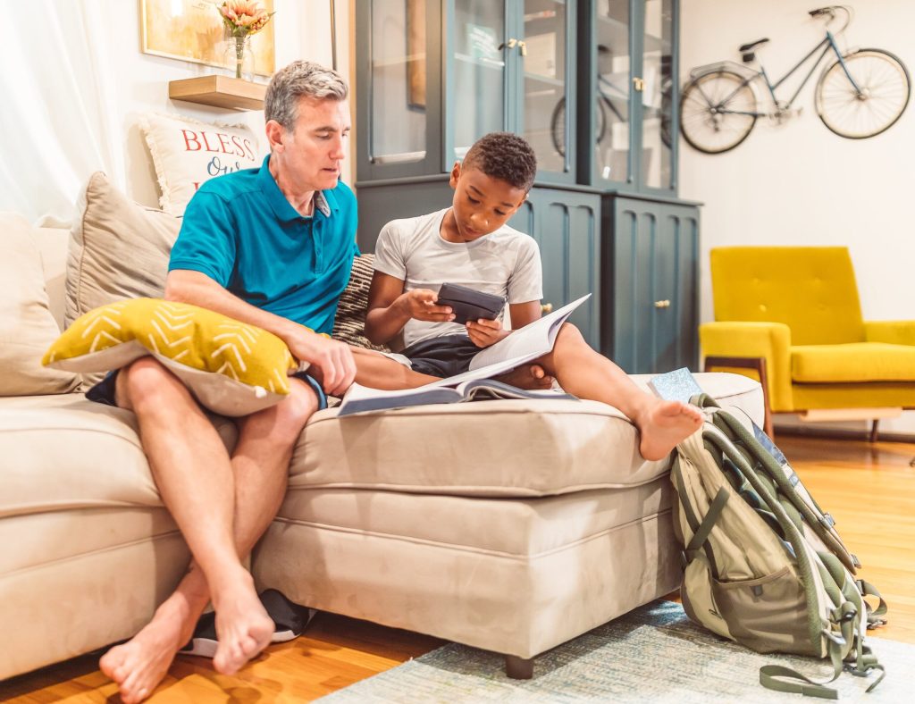 Man sitting with boy