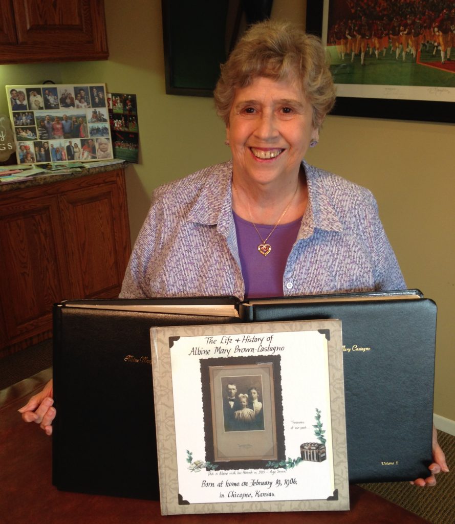 Woman holding photo books