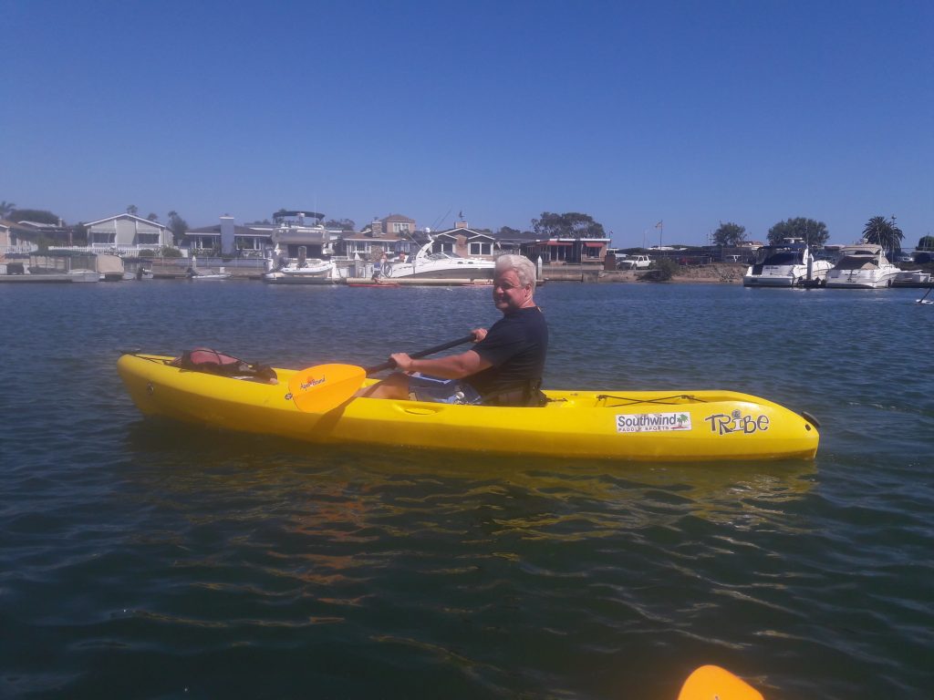 Man in yellow kayak